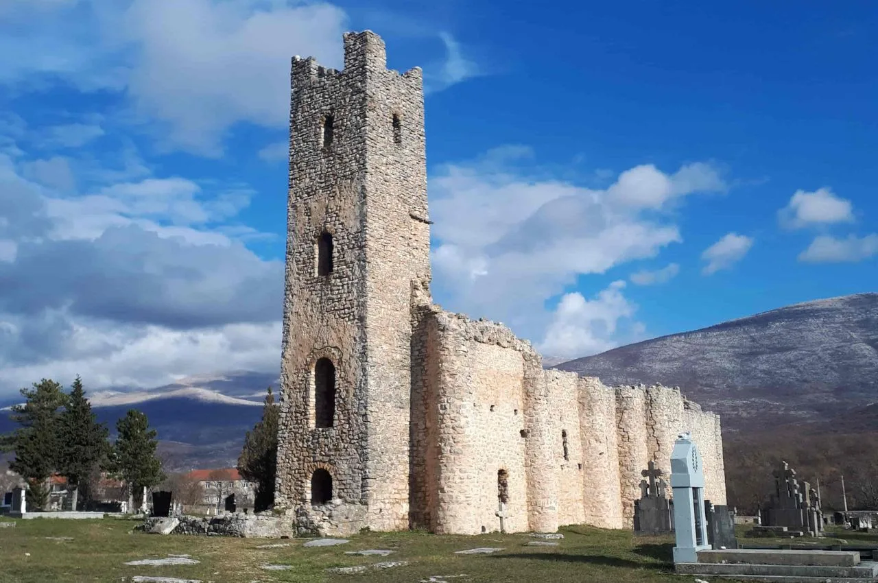 Ancient stone church from 9th century with body and belltower.